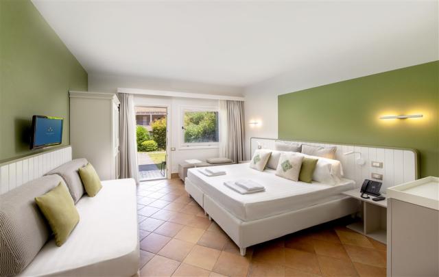 Chia Laguna_Hotel Village_Garden Cottage Triple1_Green.jpg