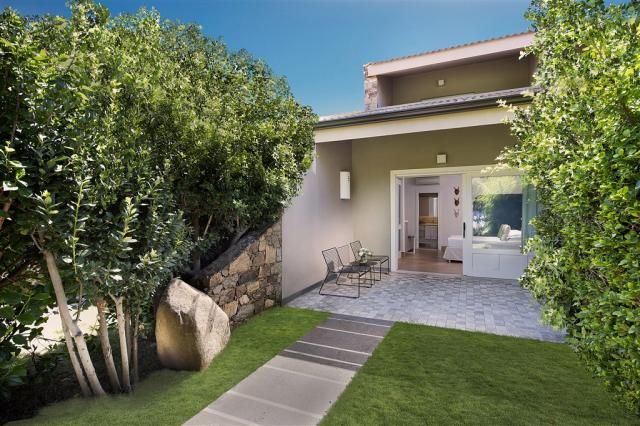 Chia Laguna_Hotel Village_Pool Room_Exterior.jpg