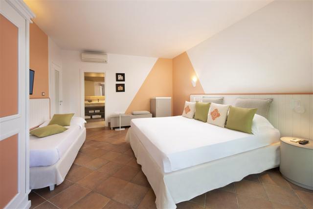 Chia Laguna_Hotel Village_Pool Room Triple.jpg
