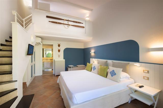 Chia Laguna_Hotel Village_Pool Family Room1.jpg