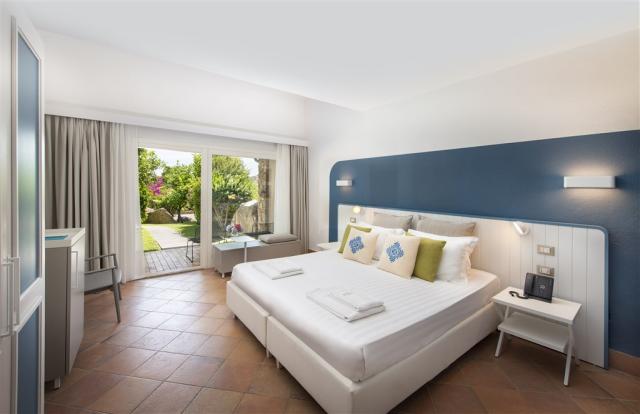 Chia Laguna_Hotel Village_Superior Cottage Room1_Blue.jpg