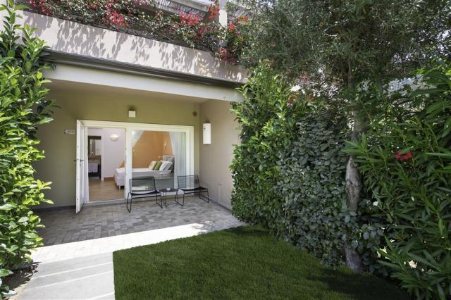 Chia Laguna-Hotel Village_Superior Cottage_Pink_Exterior Privat