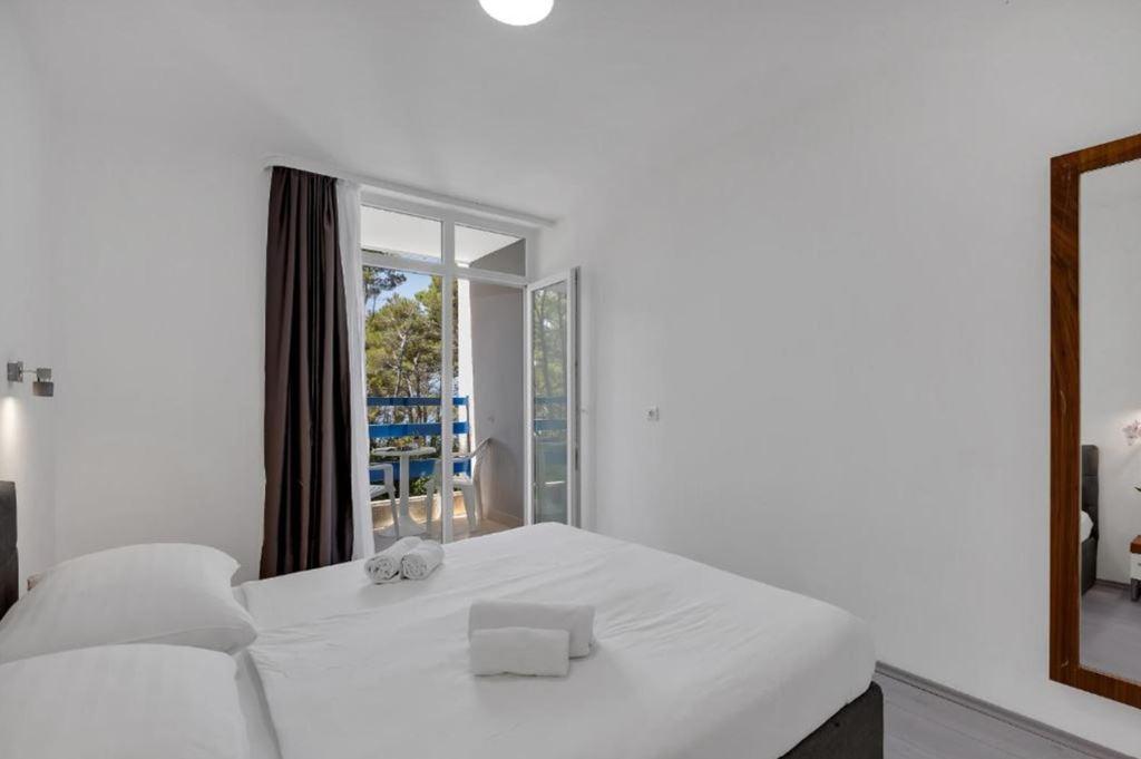 2lůžkový pokoj Standard s přistýlkou a balkonem, Hotel Alem, CK