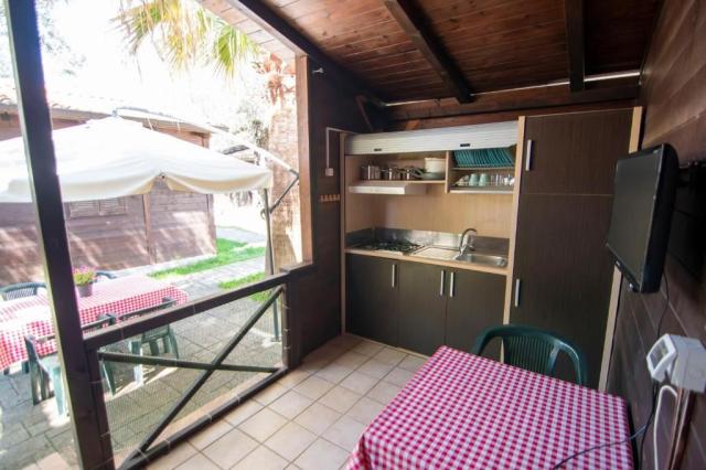 CK CK, Villaggio Esca, Marina di Camerota - dřevěný bungalov - 