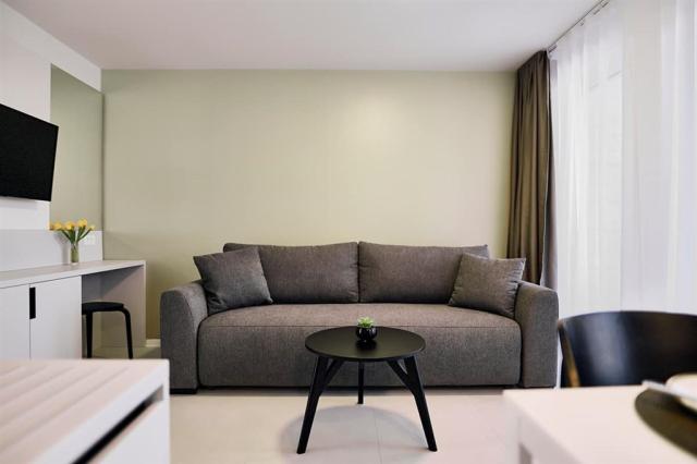 Malinska-Green-Apartments-Krk-Croatia-living-room-with-kitchen_