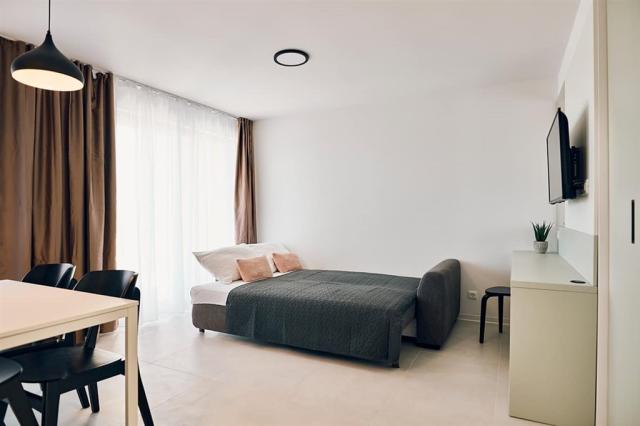 Malinska-Green-Apartments-Krk-Croatia-living-room-with-kitchen_