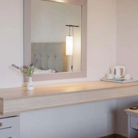 accommodation-nafsika-room-mirror-desk-other-side-700x700.jpg