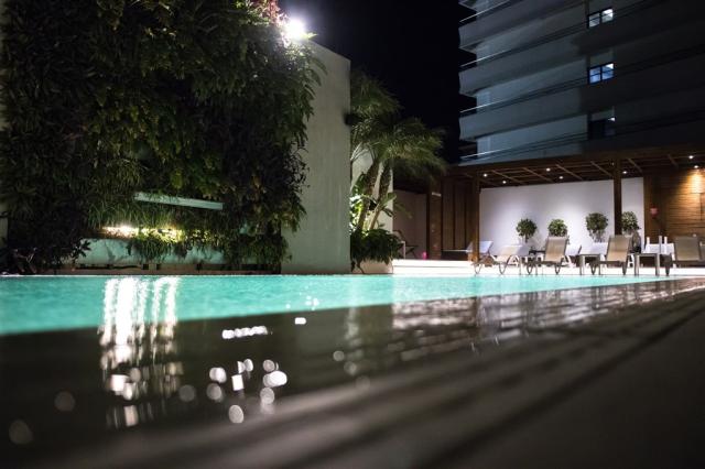 manousos-city-hotel-gr-rhodes_pool-night (1).jpg
