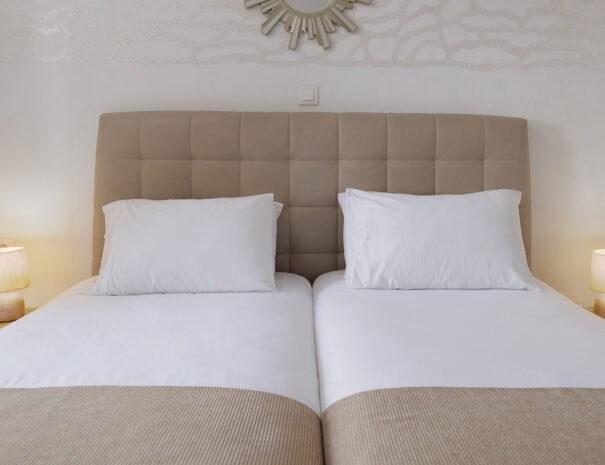 hotelnefeli-gardenview-doubleroom-bed-605x465.jpg