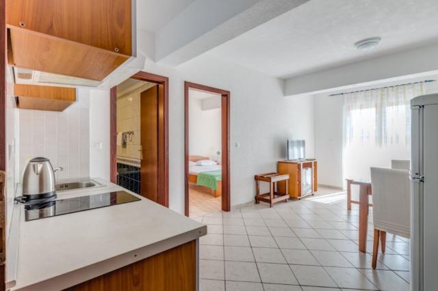 Apartmány Nikolina - kuchyňský kout