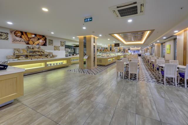 RAMADA HOTEL & SUITES BY WYNDHAM KUSADASI - Restaurace - Main R