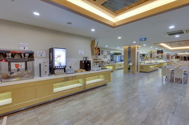 RAMADA HOTEL & SUITES BY WYNDHAM KUSADASI - Restaurace - Main R