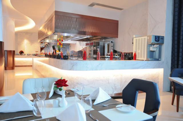ROYAL M AL AQAH BEACH RESORT BY GEWAN - Restaurace - Palomino