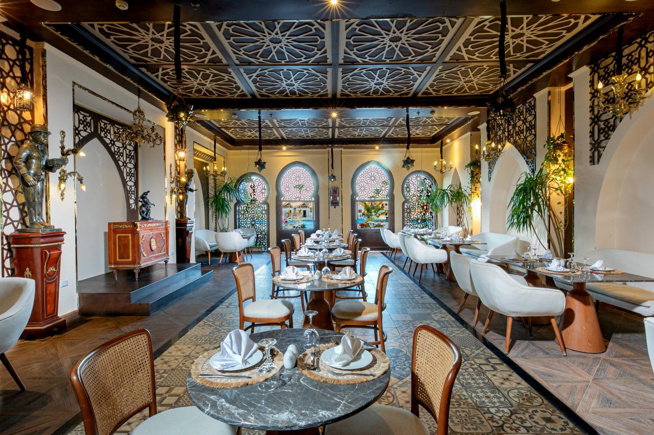 PANORAMA BUNGALOWS RESORT EL GOUNA - Restaurace - Tajn Restaura