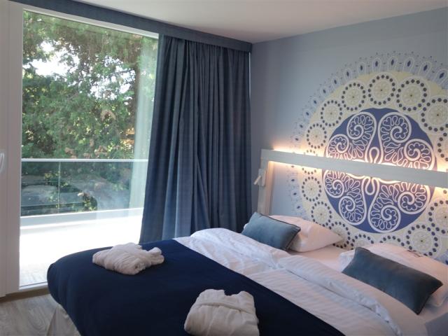 Posteľ na izbe v hoteli Falkensteiner Club Funimation